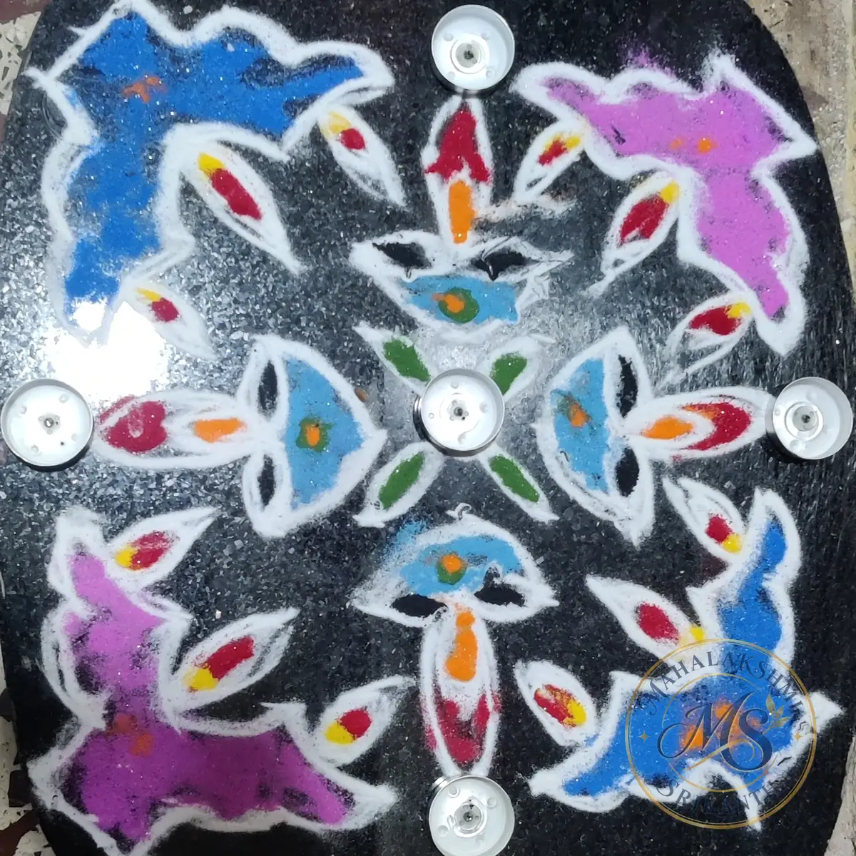 Blue And Purple Rangoli With Diyas — rangoli by Mahalakshmi Srikanth