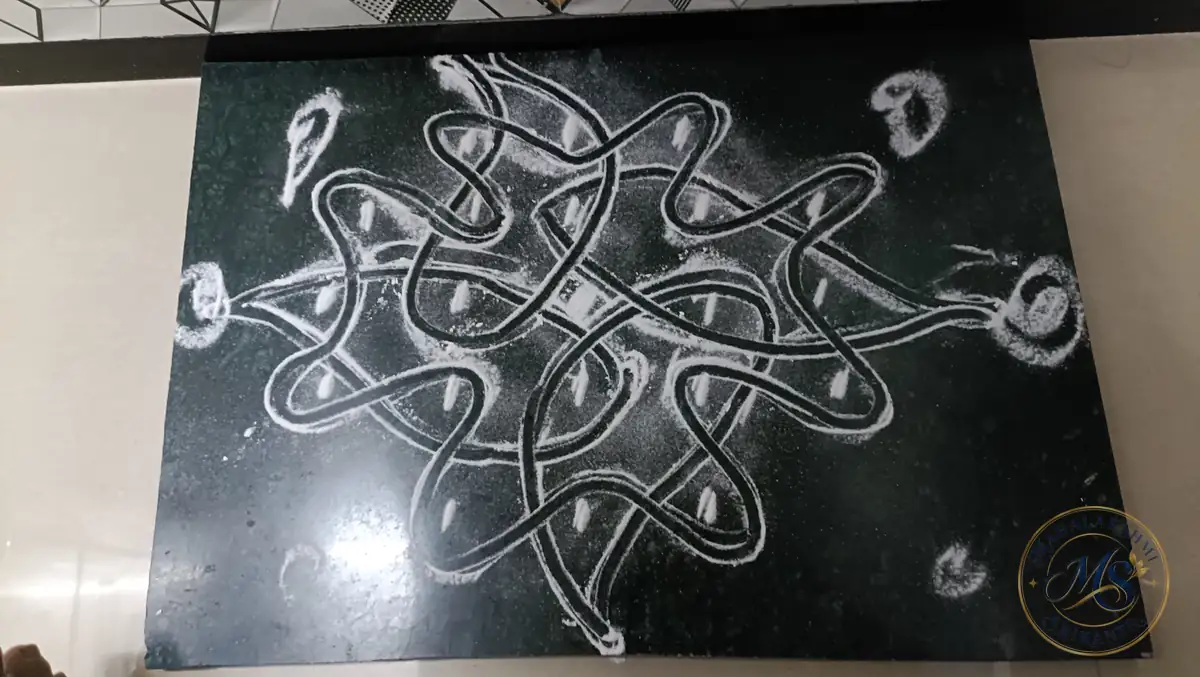 White Knot Kolam — rangoli by Mahalakshmi Srikanth